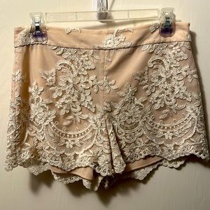 Alice + Olivia nude shorts with hand stitch floral appliqué
